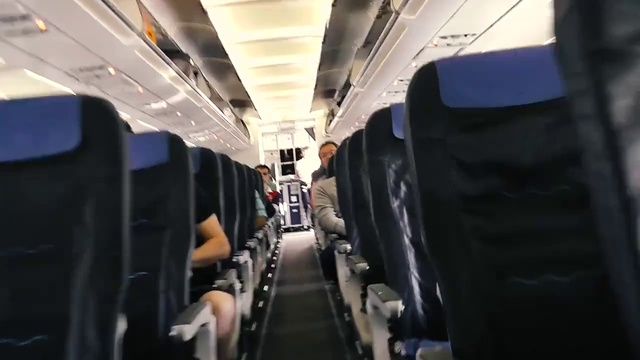 Video Reference N1: Air travel, Airline, Transport, Vehicle, Aircraft cabin, Passenger, Aisle, Aerospace engineering, Airplane