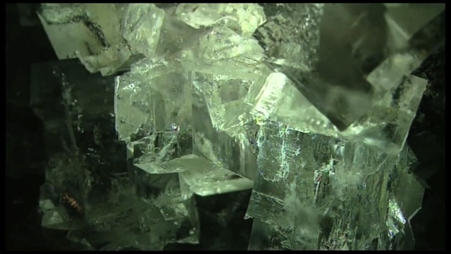 Video Reference N4: Green, Crystal, Mineral, Rock, Organism, Water, Geology, Formation, Quartz, Space, Person