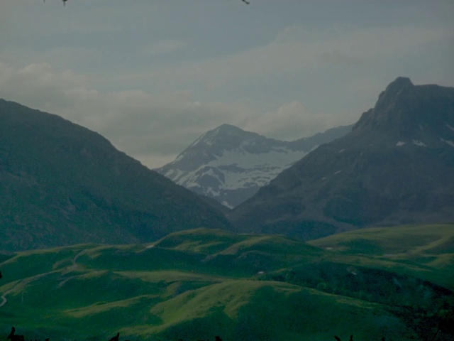 Video Reference N1: Mountainous landforms, Highland, Mountain, Hill station, Nature, Mountain range, Green, Hill, Sky, Fell