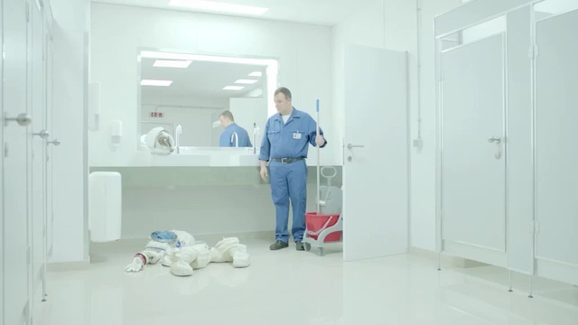 Video Reference N1: blue, room, hospital, floor, clinic, product, bathroom, flooring, service, window, Person