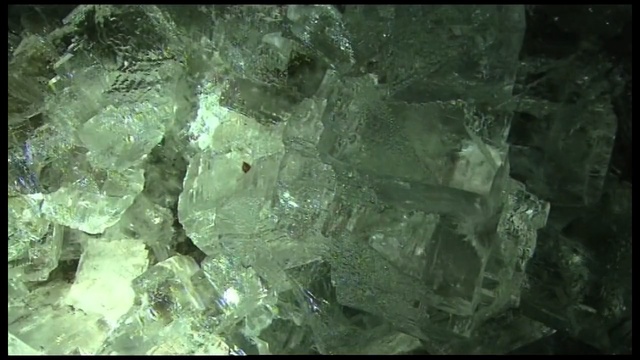 Video Reference N3: Green, Crystal, Mineral, Quartz, Gemstone, Rock, Fashion accessory, Geology, Organism, Jewellery, Person
