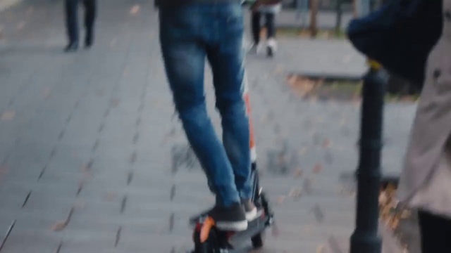 Video Reference N3: Jeans, Footwear, Denim, Roller skating, Trousers, Street fashion, Shoe, Vehicle, Kick scooter, Sports equipment