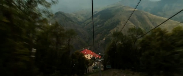 Video Reference N4: nature, mountainous landforms, mountain range, ecosystem, mountain, wilderness, extreme sport, cable car, sky, mode of transport