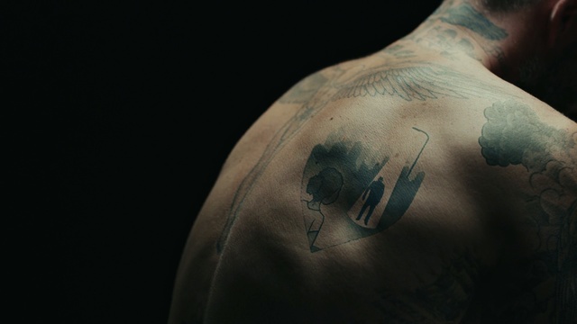 Video Reference N16: man, tattoo, arm, muscle, back, human, chest, darkness, hand, barechestedness