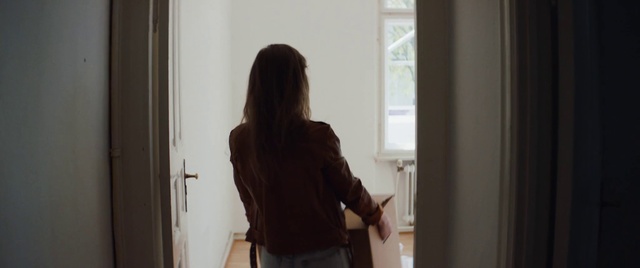 Video Reference N1: Hair, Standing, Shoulder, Long hair, Room, Door, Window, Joint, Hand, Outerwear