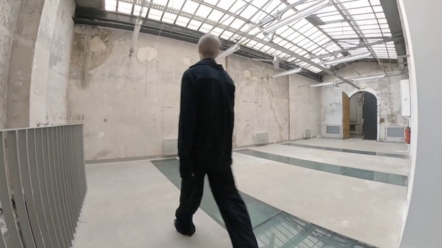 Video Reference N1: Standing, Snapshot, Daylighting, Floor, Architecture, Outerwear, Photography, Suit, Flooring
