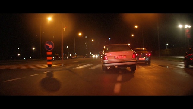 Video Reference N16: Mode of transport, Street light, Lighting, Night, Vehicle, Car, Light, Lane, Automotive exterior, Road, Person