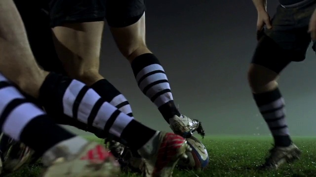 Video Reference N18: Footwear, Football, Cleat, Sports equipment, Sports gear, Player, Football player, Human leg, Ball, Tackle