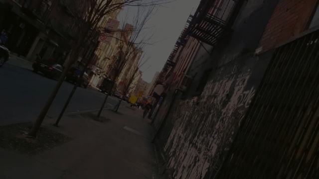 Video Reference N2: alley, urban area, sky, town, infrastructure, street, mode of transport, road, light, wall