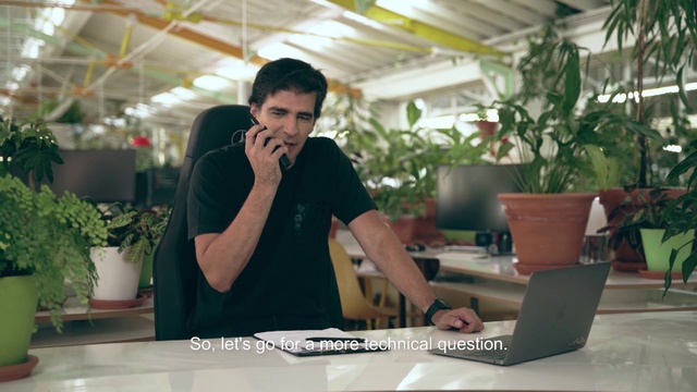 Video Reference N1: Houseplant, Technology, Mouth, Electronic device, Table, Sitting, Photography, Plant, Leisure, White-collar worker