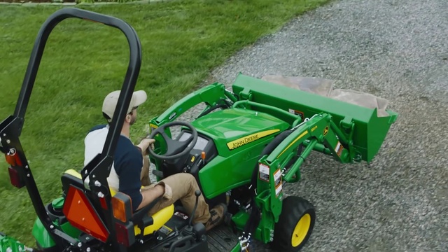 Video Reference N3: Land vehicle, Vehicle, Lawn, Mower, Walk-behind mower, Grass, Tractor, Agricultural machinery, Outdoor power equipment, Lawn aerator
