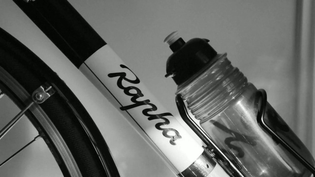 Video Reference N2: White, Water, Material property, Black-and-white, Bottle, Tire, Wheel, Photography, Auto part, Water bottle