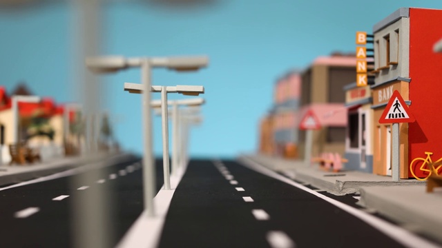 Video Reference N9: Road, Scale model, Lane, Transport, Sky, Infrastructure, Mode of transport, Highway, Street, Urban area