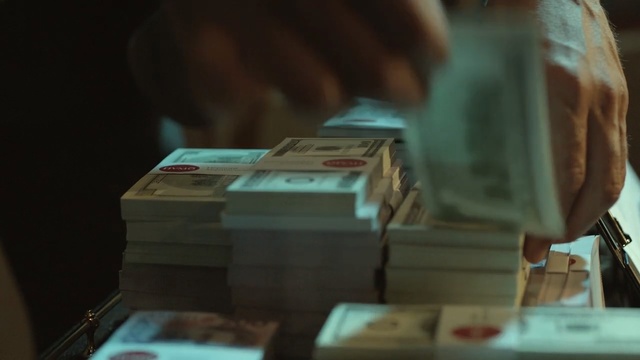Video Reference N3: hand, money, close up, dollar, low light 