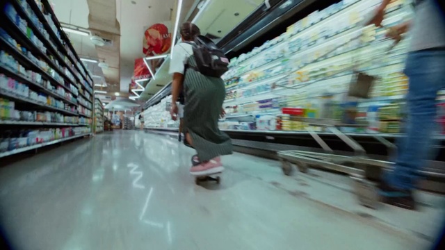 Video Reference N4: Supermarket, Aisle, Floor, Retail, Building, Flooring, Plant, Warehouse, Grocery store, Shoe