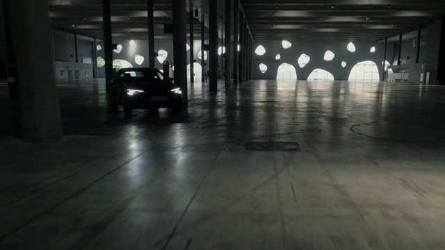 Video Reference N3: Floor, Light, Flooring, Architecture, Darkness, Parking, Concrete, Building, Night, Car