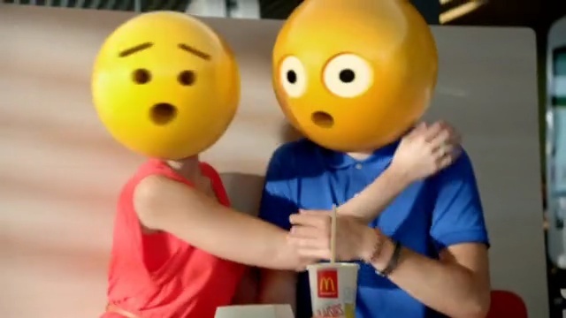 Video Reference N5: yellow, facial expression, smile, emotion, happiness, mascot, balloon, hand, material, play, Person