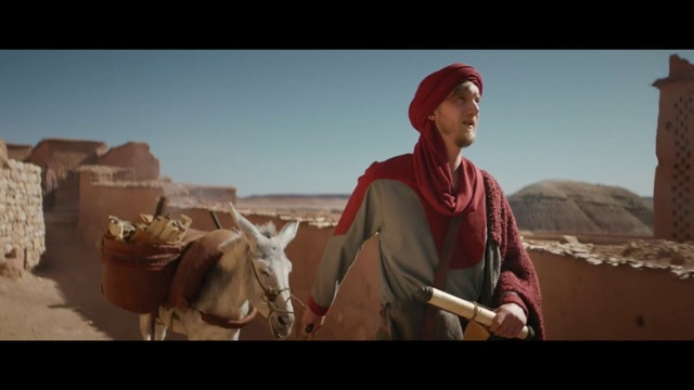 Video Reference N1: Camel, Natural environment, Landscape, Human, Camelid, Desert, Adaptation, Turban, Headgear, Pack animal