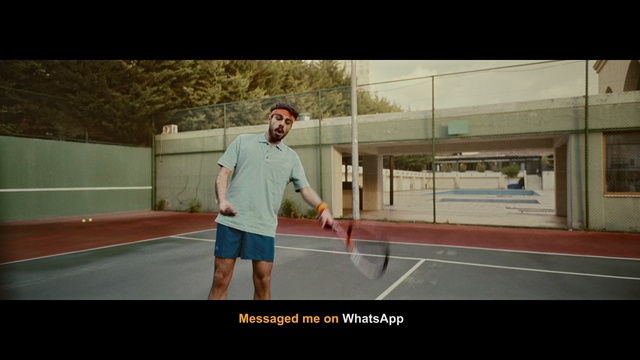 Video Reference N0: Sport venue, Tennis court, Photograph, Snapshot, Tennis, Standing, Rackets, Fun, Real tennis, Racquet sport, Person, Sport, Game, Man, Court, Board, Holding, Walking, Riding, Large, Playing, Young, Ball, Wearing, Player, Shirt, White, Room, Athletic game, Text, Racket, Sports equipment, Tennis racket