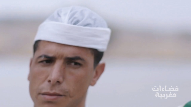 Video Reference N6: forehead, headgear, cap, turban, Person