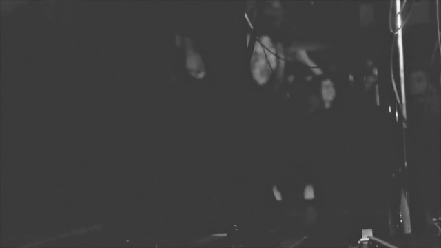 Video Reference N1: Black, Photograph, White, Black-and-white, Monochrome photography, Monochrome, Snapshot, Photography, Darkness, Tree, Man, Photo, Standing, Riding, Dark, Sitting, Wearing, Light, People, Woman, Large, Snow, Table, Night, Holding, Street, Room, Tall, Water, Skiing, Red, Group, Concert