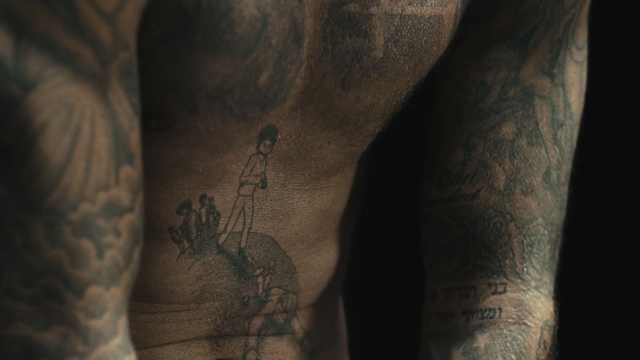 Video Reference N3: tattoo, arm, tree, hand, human body, close up, human, muscle, flesh, joint, Person