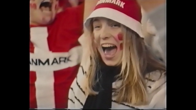Video Reference N2: Facial expression, Blond, Santa claus, Nose, Laugh, Smile, Mouth, Christmas, Headgear, Fictional character, Person, Wearing, Photo, Hat, Young, Little, Front, Boy, Small, Girl, Table, Laptop, Holding, Sitting, Black, Baseball, Uniform, Woman, Computer, Man, Red, White, Standing, Blue, Human face, Text, Fashion accessory, Clothing