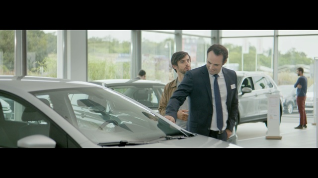 Video Reference N5: groom, office, businessman, business, corporate, man, executive, laptop, professional, businesspeople, meeting, male, computer, businesswoman, team, happy, people, adult, working, teamwork, person, suit, confident, successful, sitting, success, work, job, desk, manager, group, communication, table, worker, men, workplace