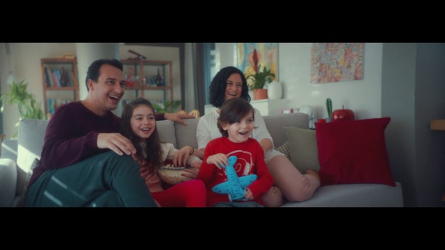 Video Reference N2: People, Red, Child, Snapshot, Fun, Couch, Room, Sitting, Toddler, Smile