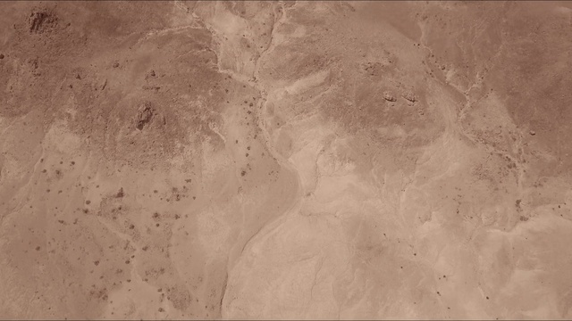 Video Reference N2: brown, soil, dust, sky, sand, geology, ecoregion, impact crater, landscape
