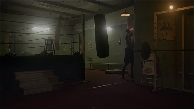 Video Reference N0: punching bag, game equipment, equipment, room, interior