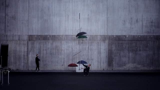 Video Reference N1: White, Wall, Red, Umbrella, Line, Sitting, Architecture, Concrete, Photography, Fashion accessory