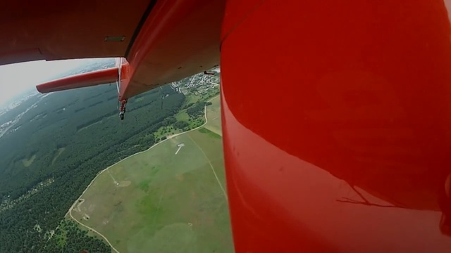 Video Reference N1: Red, Flap, Airplane, Vehicle, Air travel, Wing, General aviation, Aviation, Aircraft, Flight