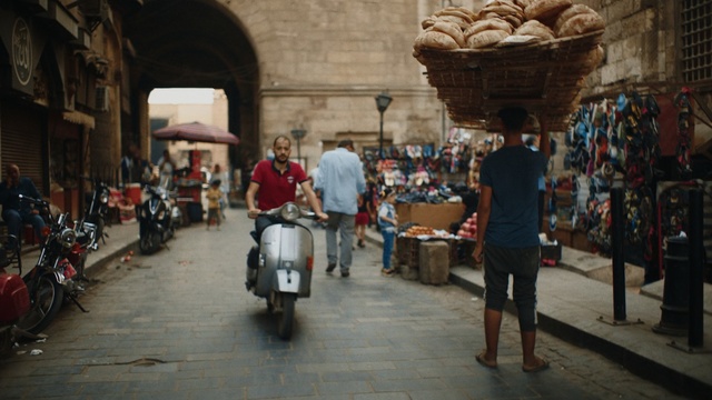 Video Reference N1: Bazaar, Public space, Market, Human settlement, Town, City, Marketplace, Street, Building, Architecture, Person