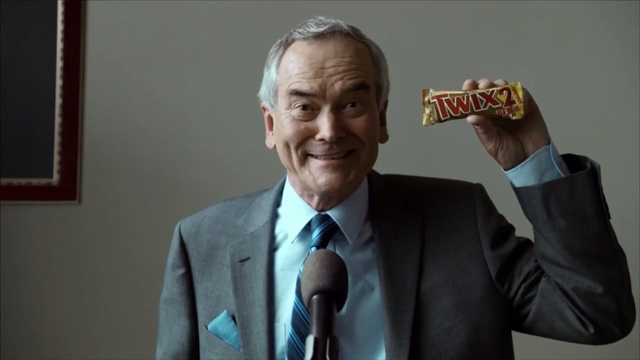 Video Reference N1: man, presentation, microphone, smile, old man, conference, chocolate, Person
