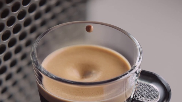 Video Reference N4: Cup, Drink, Hong kong-style milk tea, Cup, Coffee milk, Caffeine, Masala chai, Food, Café au lait, Espresso