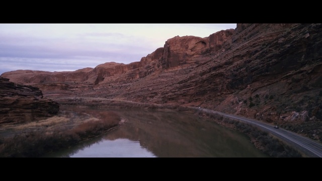 Video Reference N4: wilderness, sky, canyon, badlands, rock, wadi, geological phenomenon, cliff, terrain, highland