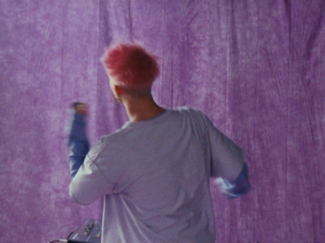 Video Reference N2: Purple, Textile, Sleeve, Gesture, Violet, Pink, T-shirt, Entertainment, Magenta, Artist