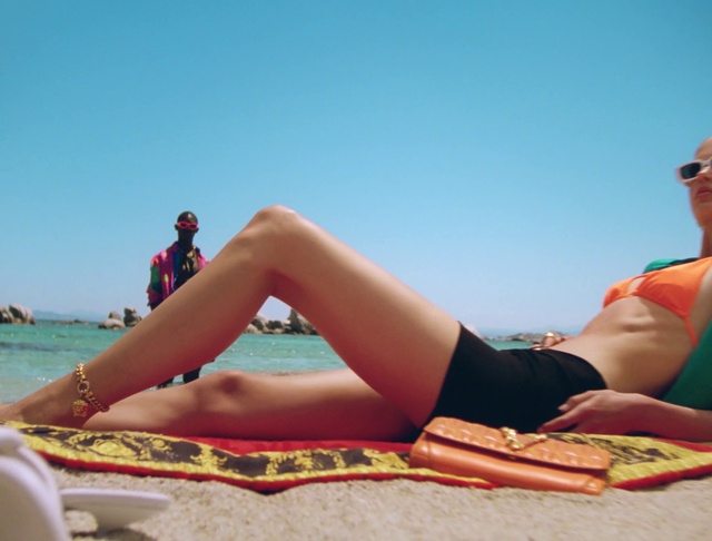 Video Reference N6: Sun tanning, Human leg, Vacation, People on beach, Leg, Summer, Swimsuit top, Thigh, Beach, Bikini
