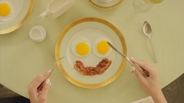 Video Reference N0: dishware, egg, tableware, plate, food, egg yolk, breakfast, ceramic, dish, porcelain