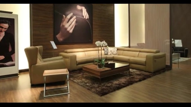 Video Reference N1: furniture, living room, couch, room, interior design, table, floor, home, loveseat, flooring