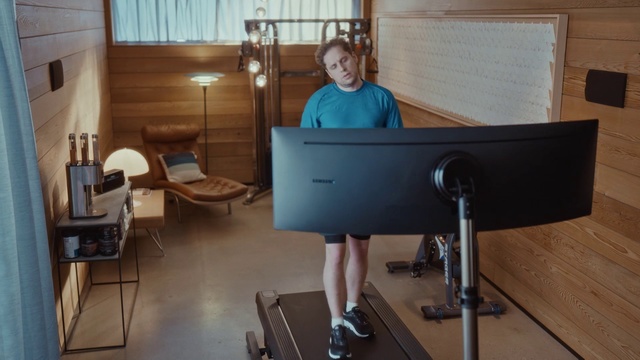 Video Reference N4: Standing, Table, Room, Desk, Furniture, Flooring, Person, Indoor, Chair, Sitting, Computer, Laptop, Small, Front, Living, Wooden, Kitchen, Woman, Young, Holding, Mirror, Man, Television, Blue, Bed, Floor, Clothing