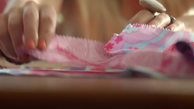 Video Reference N4: pink, skin, nail, cake decorating, sweetness, close up, finger, icing, hand, textile