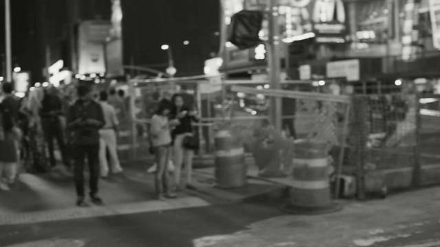 Video Reference N4: urban area, people, crowd, black and white, monochrome photography, pedestrian, street, metropolis, infrastructure, mode of transport, Person