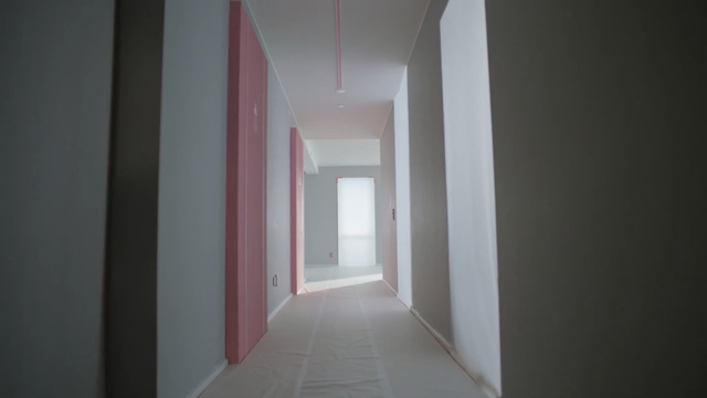 Video Reference N1: Property, Light, Room, Architecture, Wall, Floor, Line, Building, House, Ceiling, Indoor, Small, Door, White, Open, Sitting, View, Empty, Wooden, Large, Red, Mirror, Bed, Window, Plaster