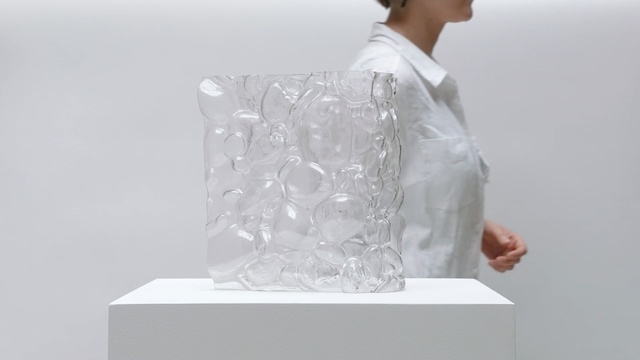 Video Reference N3: White, Transparent material, Sculpture, Design, Outerwear, Neck, Glass, Plastic, Transparency, Art