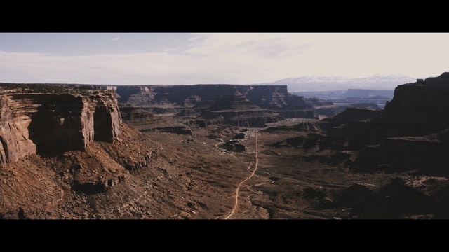 Video Reference N0: sky, badlands, canyon, rock, escarpment, national park, formation, horizon, plateau, wadi