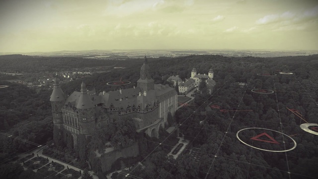 Video Reference N1: Aerial photography, Sky, Landmark, Urban area, City, Horizon, Photography, Atmosphere, Landscape, Bird-eye view, Outdoor, Photo, Grass, Old, White, Black, Mountain, Large, Standing, Man, People, Group, Field, Hill, Riding, Track, Street, Cloud, Building, Skyscraper, Text, House