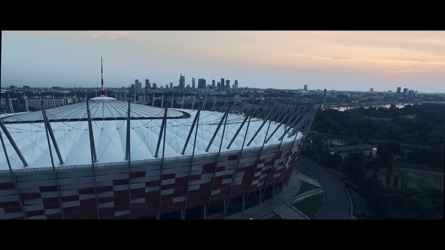 Video Reference N2: Sky, Urban area, Metropolitan area, City, Architecture, Sport venue, Cityscape, Stadium, Cloud, Skyline
