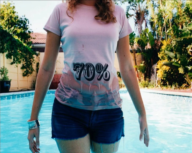 Video Reference N1: clothing, blue, t shirt, water, shorts, shoulder, leisure, fun, joint, girl